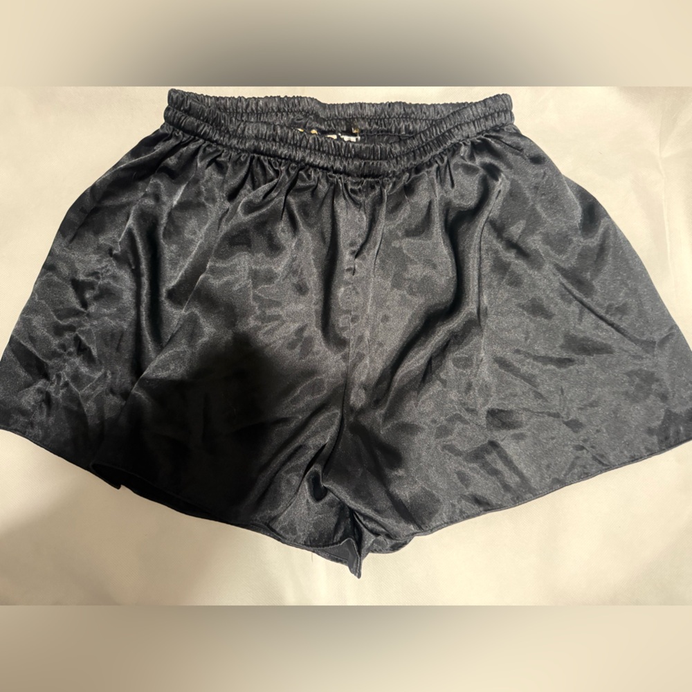 Vintage silk Victoria’s Secret gold label medium black micro mini slip shorts.